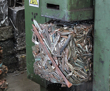 Non-ferrous metal compacted for recycling.