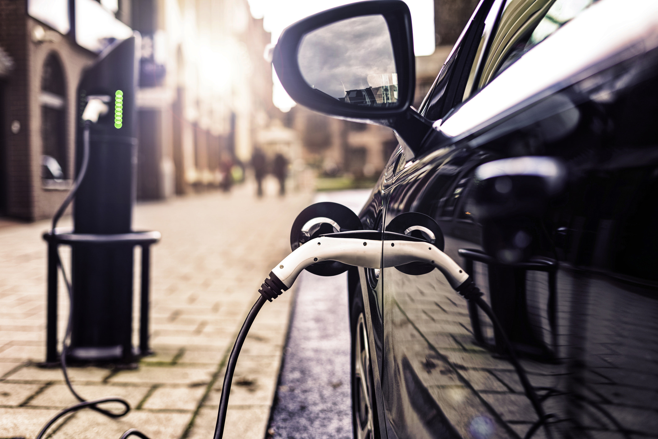 Electric Vehicle in Park Charging station in UK Street