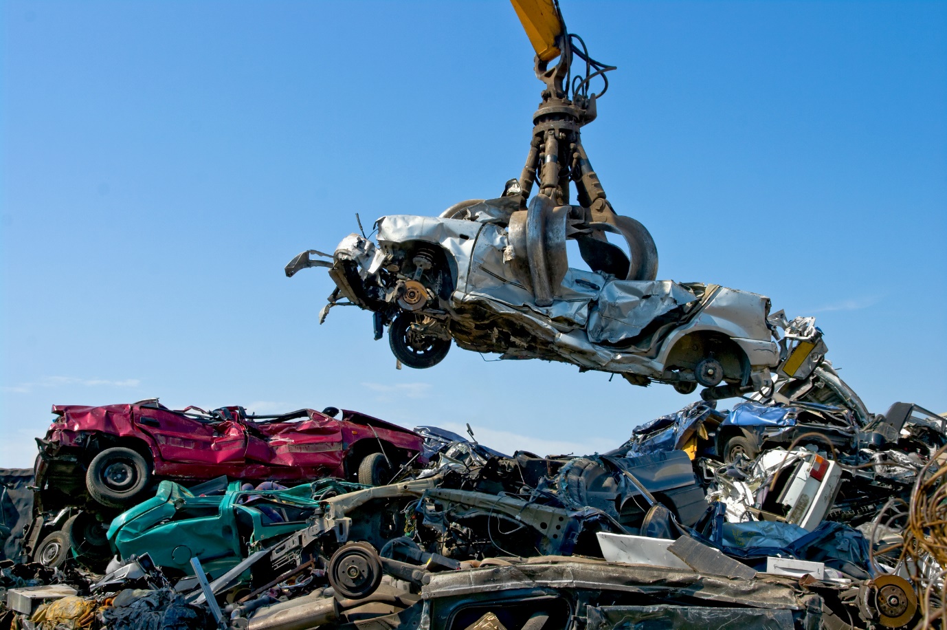 car in scrap metal yard