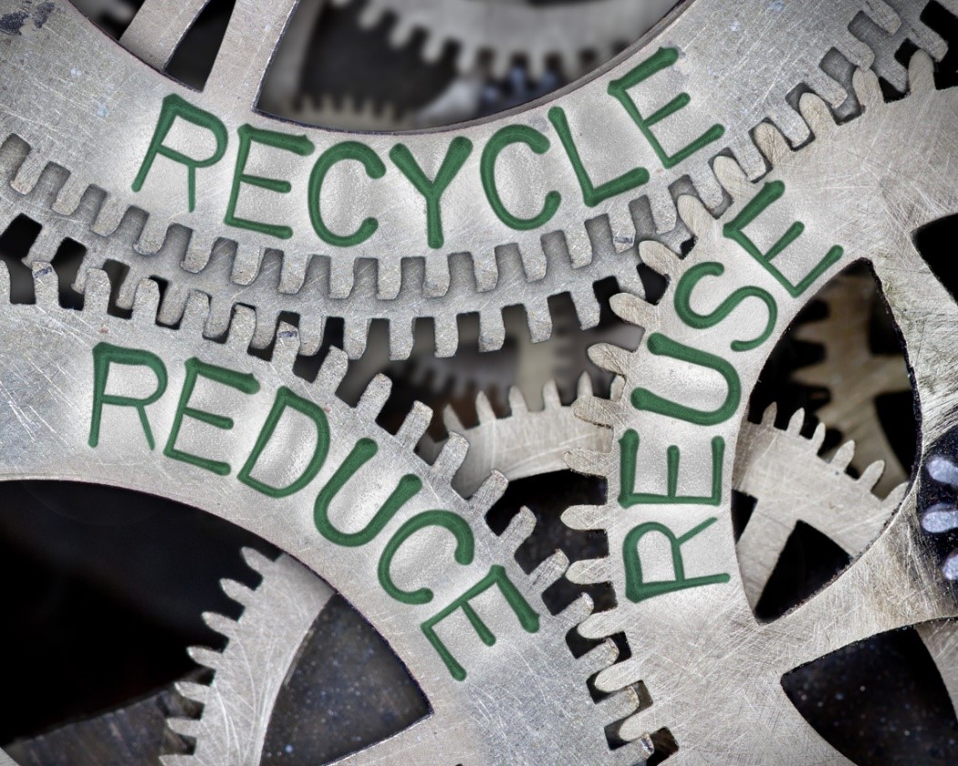 scrap metal with 'reduce, reuse recycle'