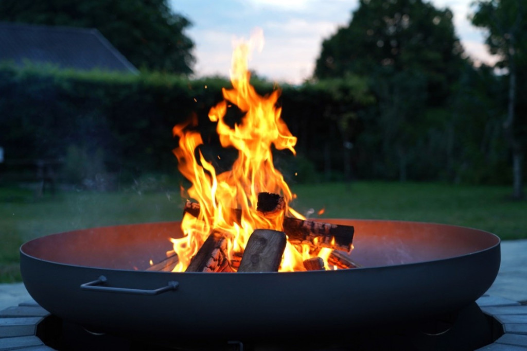 A metal fire pit